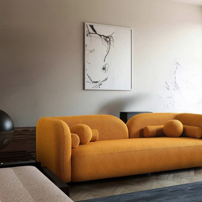 Side profile showing bouclé fabric texture and sleek design