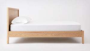Side profile of The Echelon Bed, highlighting the clean lines and floating design."