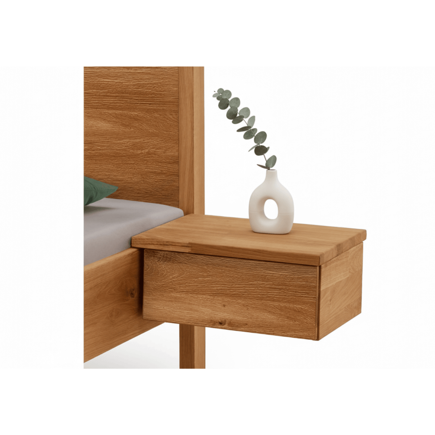Side view of the bed's clean lines and solid construction for maximum durability. Wooden nightstand with a vase and plant on a white background