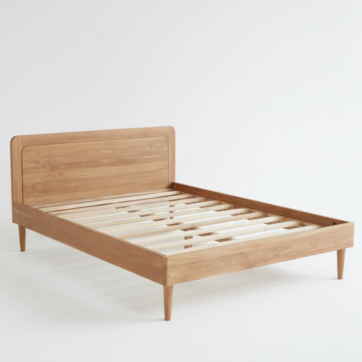 Close-up of Smooth Rounded Headboard on KAYA Solid Teak Bed Frame SIDEVIEW