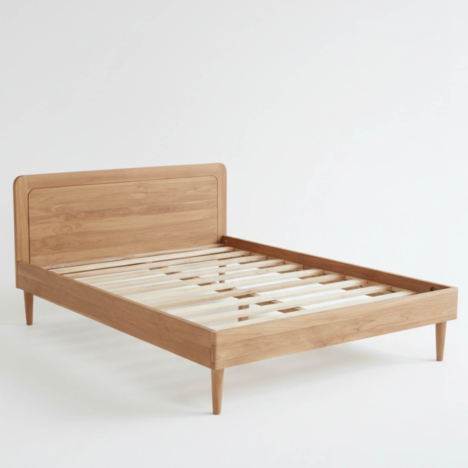 Close-up of Smooth Rounded Headboard on KAYA Solid Teak Bed Frame SIDEVIEW