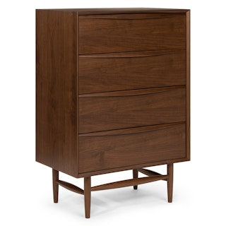 Wooden dresser with four drawers on a white background