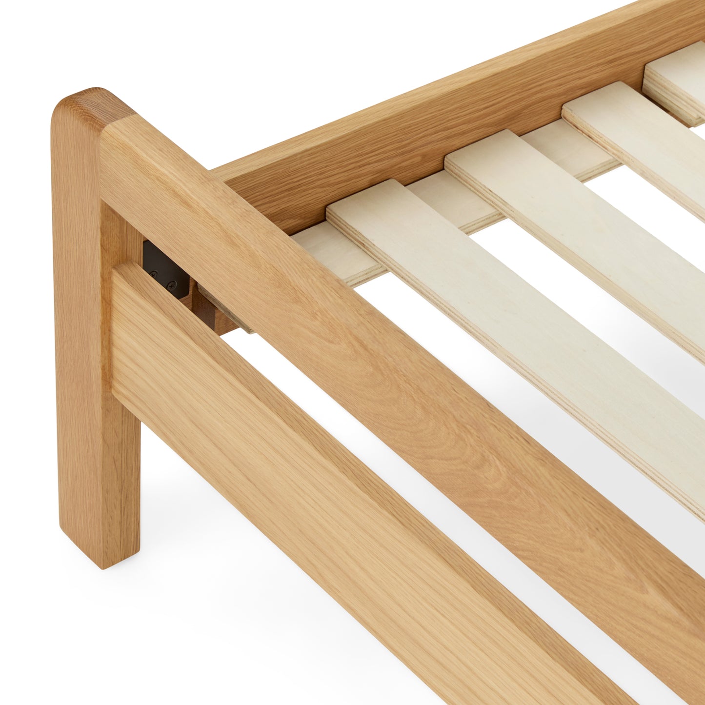 "A macro shot of the natural oak wood finish, showing its smooth texture and rich color."